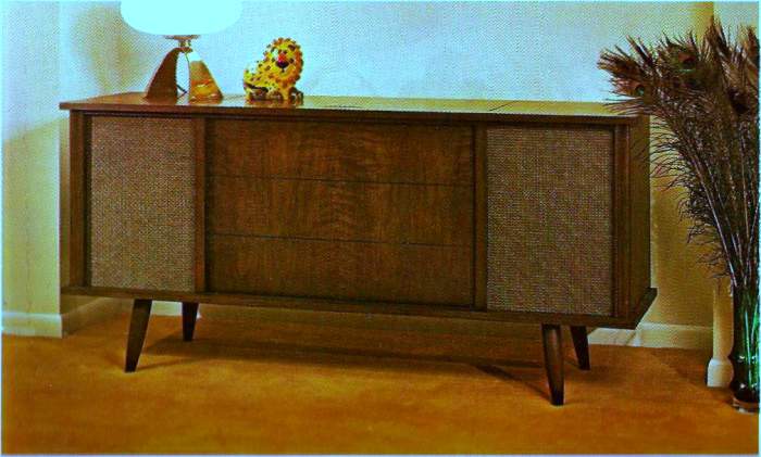 The Waverly, Model 40M779, Genuine walnut veneer and selected wood solids. Dimensions are 60 inches long, and 28 inches high, with custom stereo sounds system and four made in Texas speakers. $199.95.