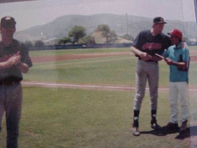 That's my manager, J.R. Caviness handing me the MVP Award in the '96 NABA All Star Game at Moorpark College (CA)