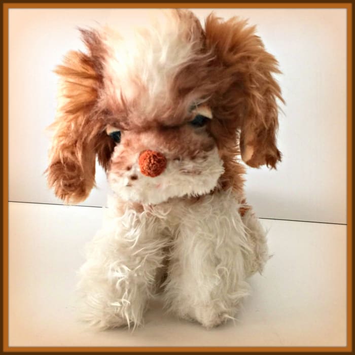 Beautiful vintage eleven inches tall plush dog by the Character Novelty Company, made in the United States back in the late 1950s.