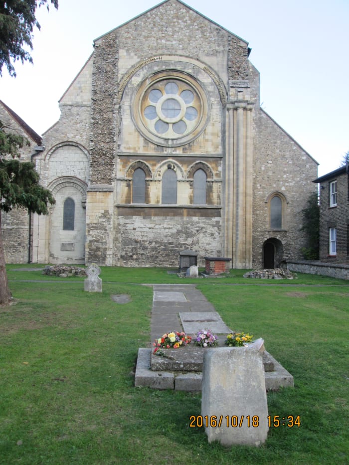 Viewing over Harold's burial site to the 'cut-off' church end, you can see the point where the original church ended, marked on the ground by kerb stones that follow the line of the wall.