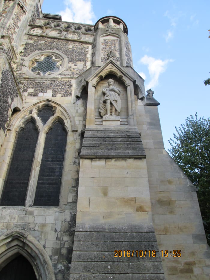 Close to the church door at Waltham. Having recovered from a near-fatal illness, Harold contributed a small fortune to have the church improved and a college was founded