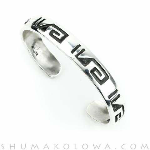Hopi Summer Cloud overlay cuff bracelet. Made by Hopi native Anderson Koinva.