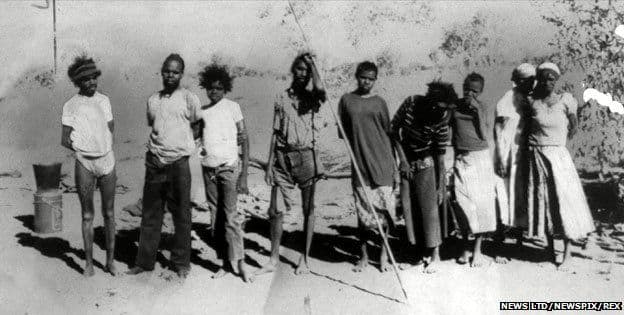This is a photograph of the "pintupi nine" in 1984. The group consisted of two sisters and their seven teenage children - four brothers and three sisters, who shared one father. They were completely isolated from the modern world until 1984.