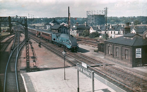 New Barnet Station in pre-WWII days and the scene of a well-rehearsed evacuation from North London districts in early September, 1939 - an LNER 'Streak' (Class A4 Pacific) heads for King's Cross Station, London with an evening express