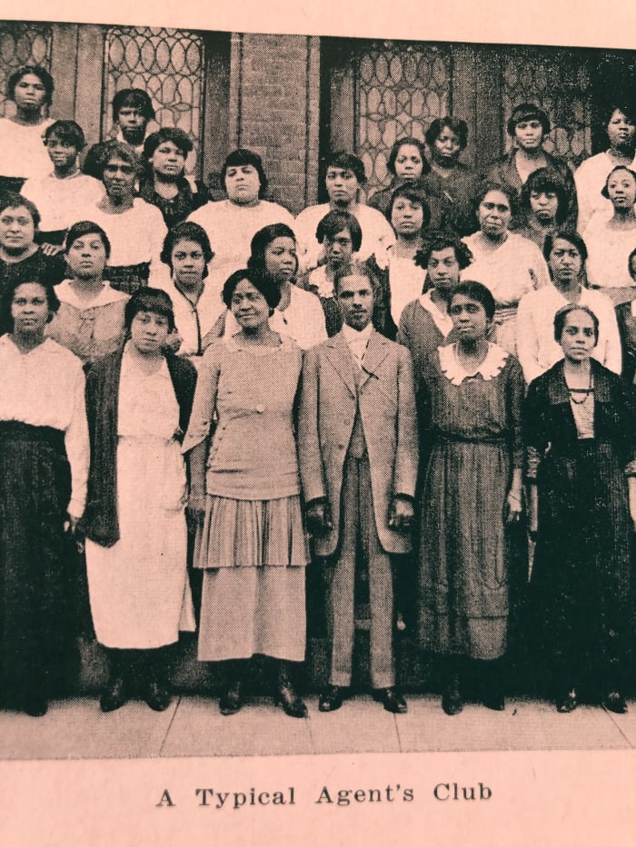 Annie pictured here (3rd from Left), with husband John next to her and surrounded by Poro Company Agents about 1920.