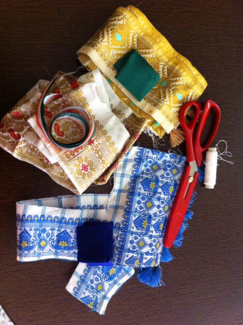 Gather the scrap fabric: Here it is old silk sari border, colored ribbon, matching threads