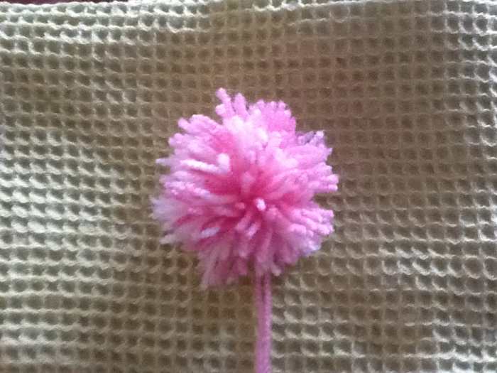 Does your hat need a pom pom Supplies needed: 2 cardboard doughnuts..I used a shirt box, so that it would be easier to cut through. Scissors tapestry or yarn needle yarn