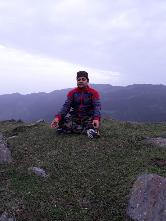 It was 6 am and there was only one local boy who clicked this photograph of me. When he had gone, I sat there for 30 minutes. I was able to hear the flapping of all the birds that were while flying above my head. This area was so peaceful.