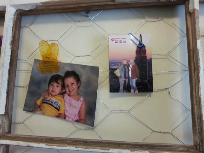 This section holds a sweet photo of two of my grandchildren, and then another of my daughter (far right) and a friend in NY City on their first visit.