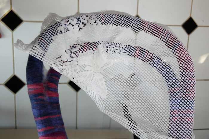 It is sometimes and advantage to see the fibers below. Rub until the fibers below until they begin to attach themselves to the netting.