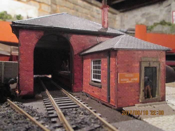 This is where the wagon weighbridge will be added, in front of the large - slightly ajar - window of the office. Balsa was added and painted to improve the appearance of the window sill