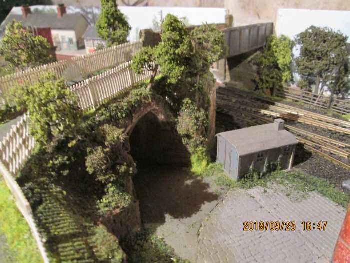 The occupation bridge and goods/coal depot access road with picket fencing instead of NER/LNER company style fencing - ravages of nature and time (as well as post-wartime economies)