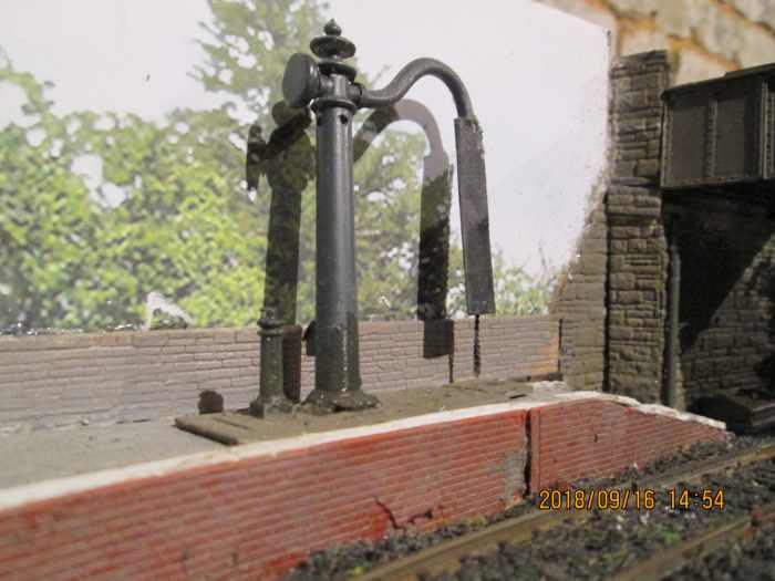 It's that Mike's Models water crane on the platform end near the occupation bridge. Steam isn't altogether a thing of the past!