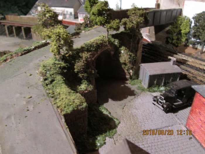The goods depot side of the occupation bridge approach has witnessed dramatic changes, with vegetation added beside the ramp and around the post-WII concrete gangers' hut. A few fences and railings are needed around the site to complete the picture