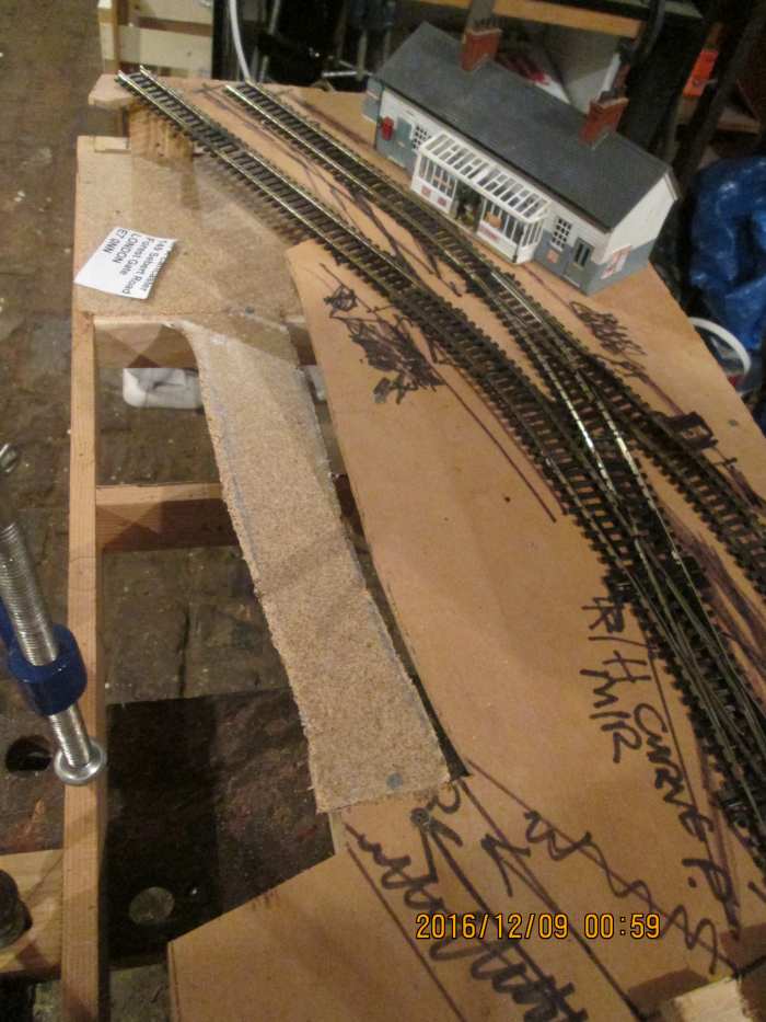 Station platform building (Aherne trophy, 2015) in situ to show where platform goes, with coal depot in front. Open area to be completed with scenery and ramp to main road. Latitude for scenic detail.