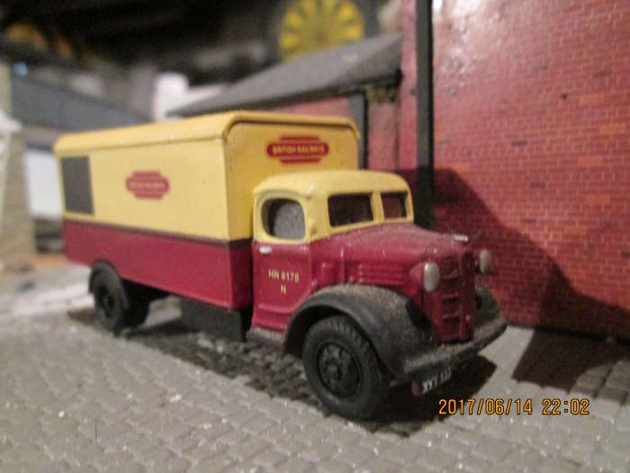 Again in early B R livery, a heavy goods delivery/collection van pauses outside the goods shed