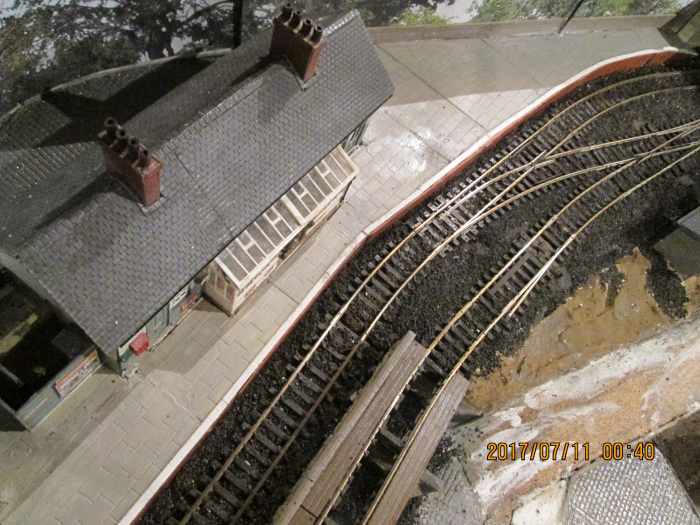 The platform curve with point leading right toward the single slip and goods depot. Coal depot walkway fixed down and painted, and now only awaits the safety fence