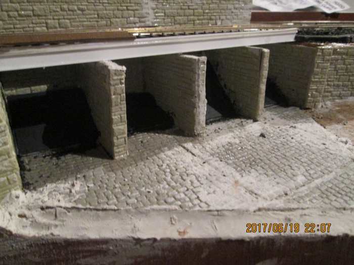 You can see the black-painted slopes in the coal cells. These will be coated with pva and generously layered with coal, to spill out beyond the cell walls (business is brisk for coal deliveries with factories, businesses and schools)