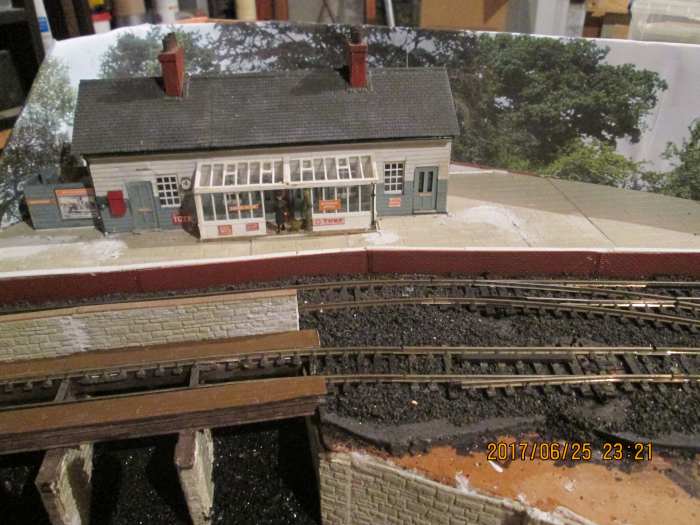 That station view again. Since this image was taken Wills' dressed stone walling (SS36) has been fixed against the backscene, along with a short piece of fencing at the roadside at the back, either side of the building.