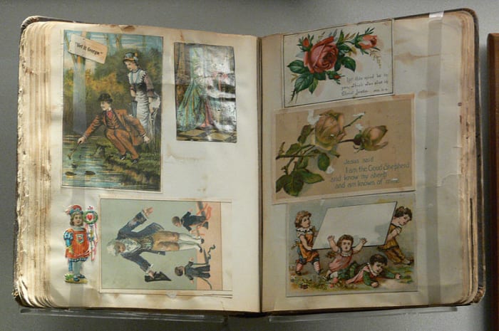 A vintage scrapbook from the late 19th / early 20th century, currently held in the Women's Museum in Dallas, Texas.