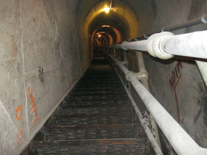 Stairs that are not OSHA approved in Hoover Dam. There is another set of stairs across the hallway that are painted yellow and are OSHA approved.