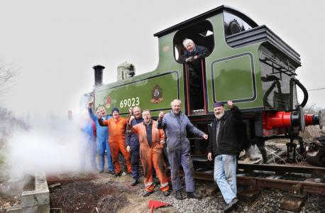 Members of the North Eastern Locomotive Preservation Group (NELPG) rest beside J72 69023 'Joem' for a group shot - loco was among last batch built to Wilson Worsdell's drawings of the 1890s - currently undergoing work at Hopetown