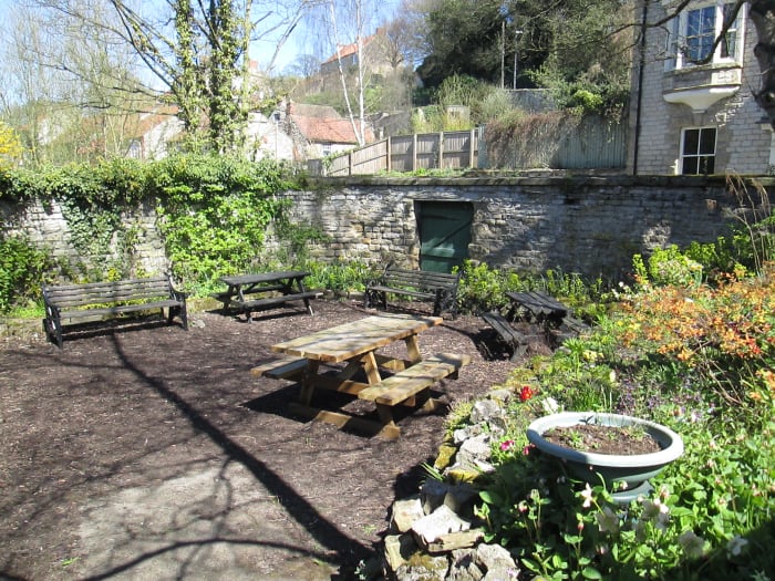 Behind the 'up' platform you'll find this peaceful little garden with benches to get away from it all - located near the porter's hut above