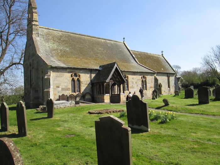 The small church of St Peter and Paul at Scrayingham near Stamford Bridge in East Yorkshire where the Hudsons and their inlaws lie buried close to the nearside wall, left of the porch