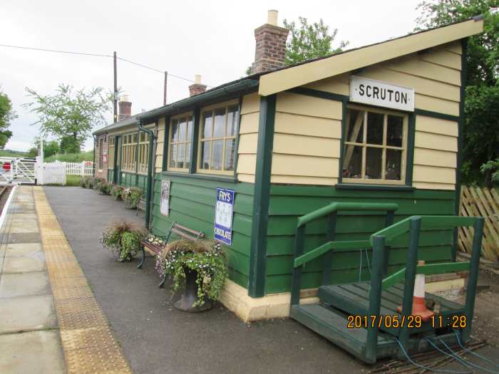 A look along the platform, west-to-east, shows the old platform signal cabin in line with the station building (SM's office, booking office, waiting rooms)