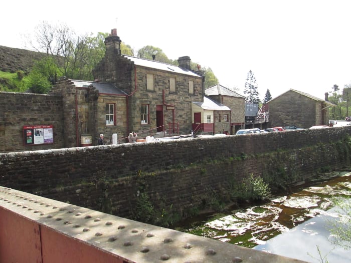 Goathland Station seen from across Goathland Beck - the village is worth a couple of hours' visit, the centre stage of 'Heartbeat' country