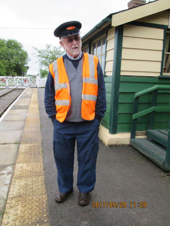 One of the WR volunteers kindly dons a British Railways station staff cap with tangerine 'British Railways' badge over the peak