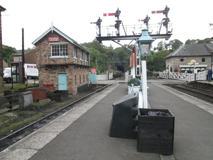 The four 'doll' bracket signal on the 'Up' platform with the signal cabin behind to the left.
