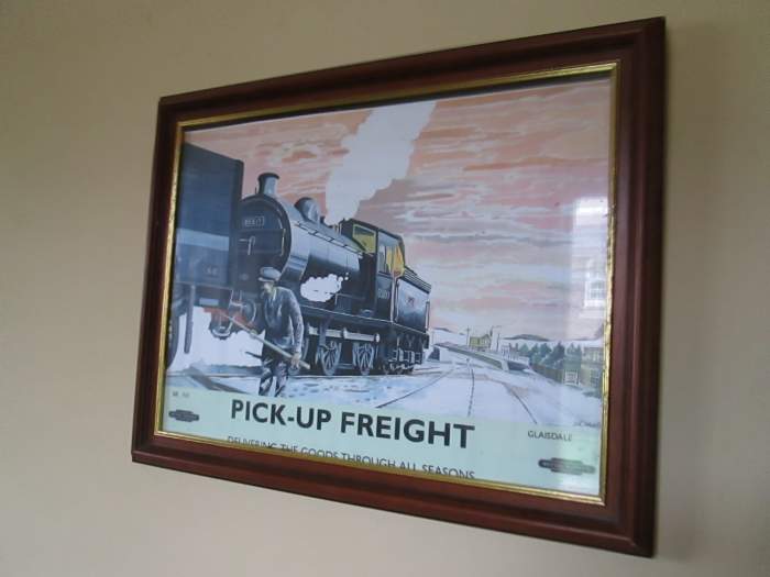 Framed and glazed public information poster shows daily pick-up goods service provided by the railway company (the caption just tells you the scene is Glaisdale on the Whitby-Middlesbrough route)