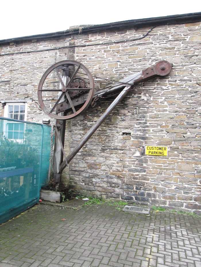 This goods crane was one of two that was set within where a track ran through behind the platform wall. The doors (above) gave access to the goods platform