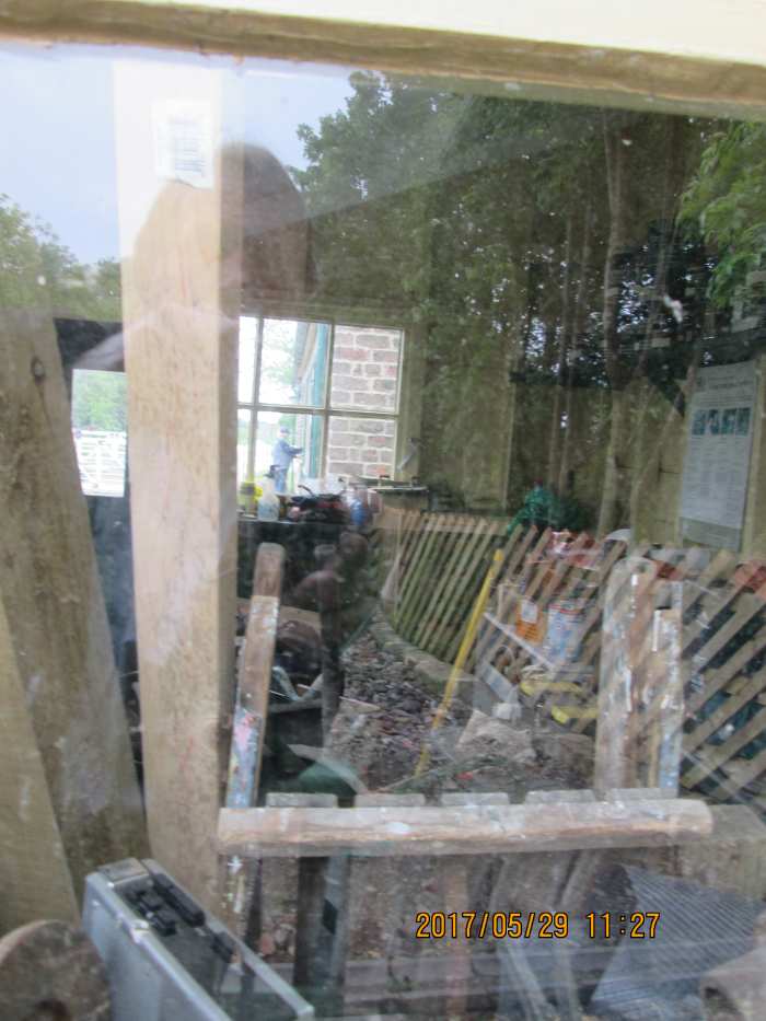A look inside the old signal cabin reveals a jumble of assorted material awaiting attention