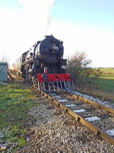 The Baldwin 2-8-0 at Crakehall with its 'Polar Express' - another couple of months and they'd have had the snow for effect!