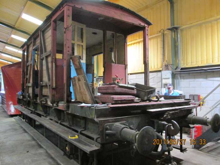 In the permanent way workshop beside the NYMR line north of New Bridge crossing, an Ashford (Kent) built BR standard brake-fitted goods brake van (for fast-running freight trains) awaits parts and restoration