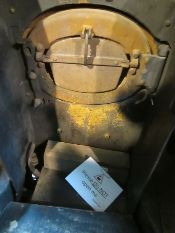 The fireman's domain: the fire door where the shiny black stuff went in by the shovel-full. These were hungry, heavy freight engines at one time diagrammed to take the 50-ton ironstone wagons from Tyne Dock to Consett via Beamish