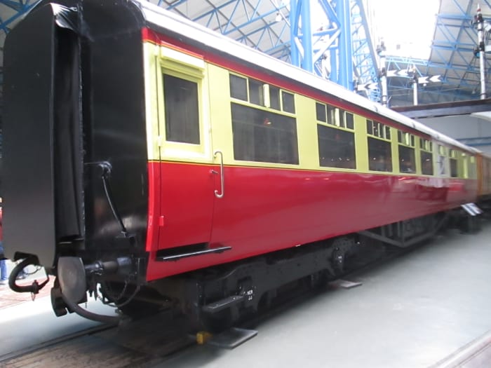 With nationalisation came a new, standard approach to carriage design. This is a Buffet car in the carmine and cream livery of the late 1940-1955 era of British Railways. Note the Gresley LNER bogies. Carriage built at York probably in 1948-50