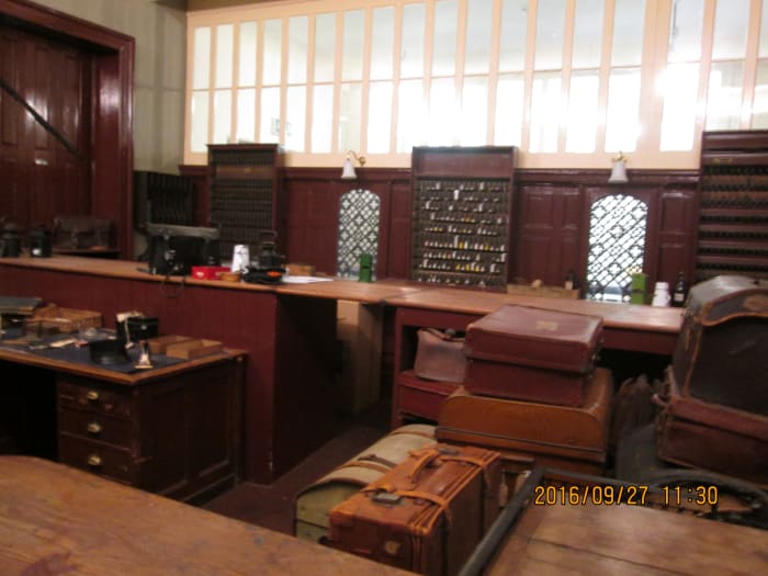 Inside the office looking from where packages were handed over for shipment. The booking office manager had a nice big comfy armchair on the left. The scene is set as in S&DR days