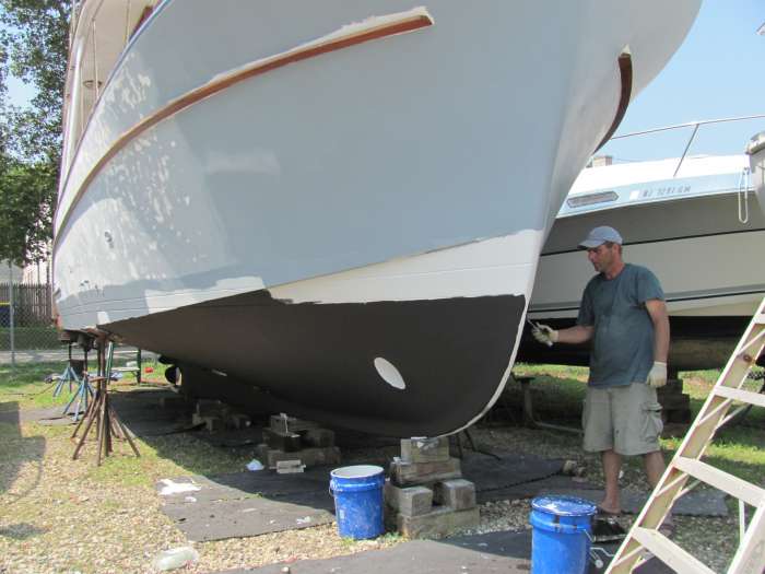 Ablative anti-fouling paint prevents barnacles from attaching to the bottom. Each coat dries quickly, so several coats can be done in a single day.