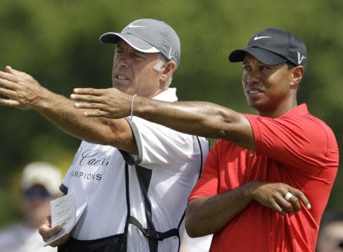 Steve Williams first day on the job with his young new boss. Good 'ol Stevie has a few things to show this skinny Eldrick Tiger Woods