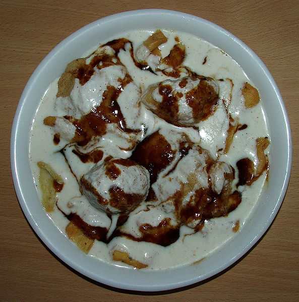 This salad contained crisp lenthil crackers soaked in curd or yogurt swirled with tamarind chutney and boiled potatoes