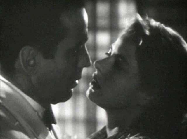 Here legendary leading man, Humphrey Bogart, is with Ingrid Bergman in a romantic scene from the motion picture Casablanca.