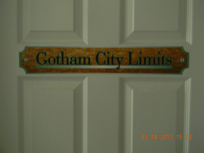 Here is the Gotham City Limits sign on the outside of the bedroom door. It was printed on indoor polypropylene and attached using DIF wallcovering adhesive.