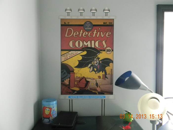 This picture is a, oversized copy of Detective Comics issue 27, May 1939, the 1st appearance of Batman. The "lights", frame and posts were all design on the computer, printed on indoor polypropylene and attached using DIF wallcovering adhesive.