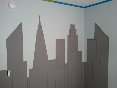 This shows the Gotham City skyline after the FrogTape was removed and after the detail lines were drawn with a black Sharpie.