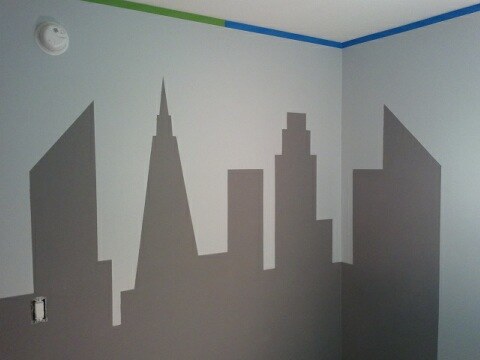 This shows the Gotham City skyline after the FrogTape was removed, but before detail lines were applied with a black Sharpie.