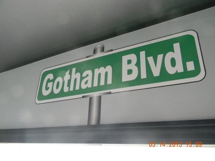Here is the Gotham Blvd sign above the window announcing that you are in Batman's home city of Gotham.