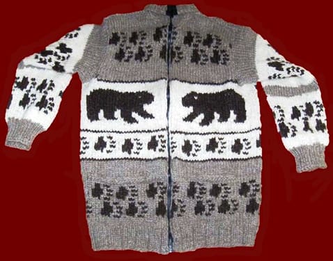 Walking Bears Cowichan sweater with charming paw prints as part of the design.